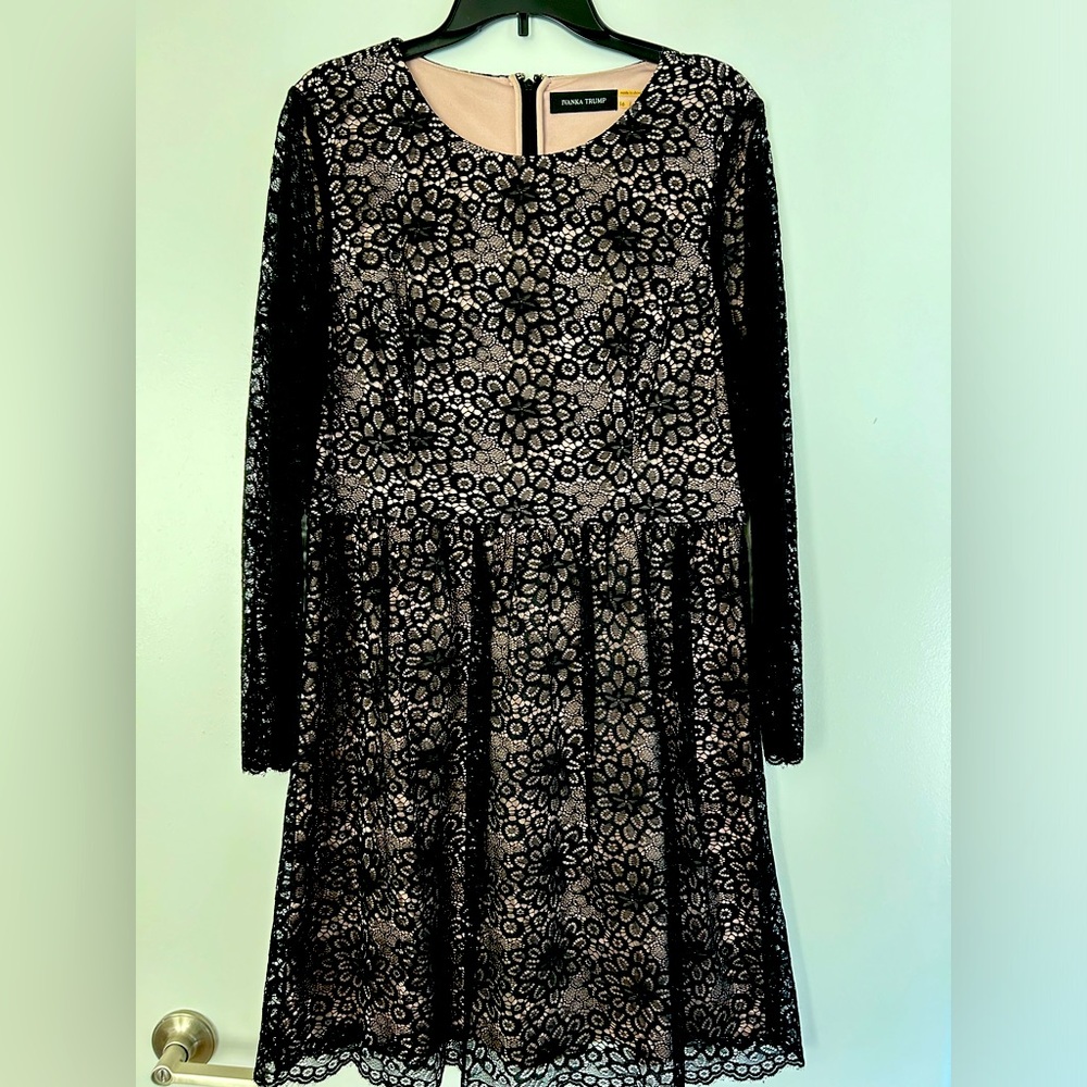 Long sleeve black lace dress with tan/cream lining.